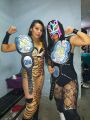 with Miss Fantasy as CRM Tag Team Champions